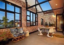 Industrial-style-courtyard-of-the-Melbourne-home-with-brick-walls-217x155