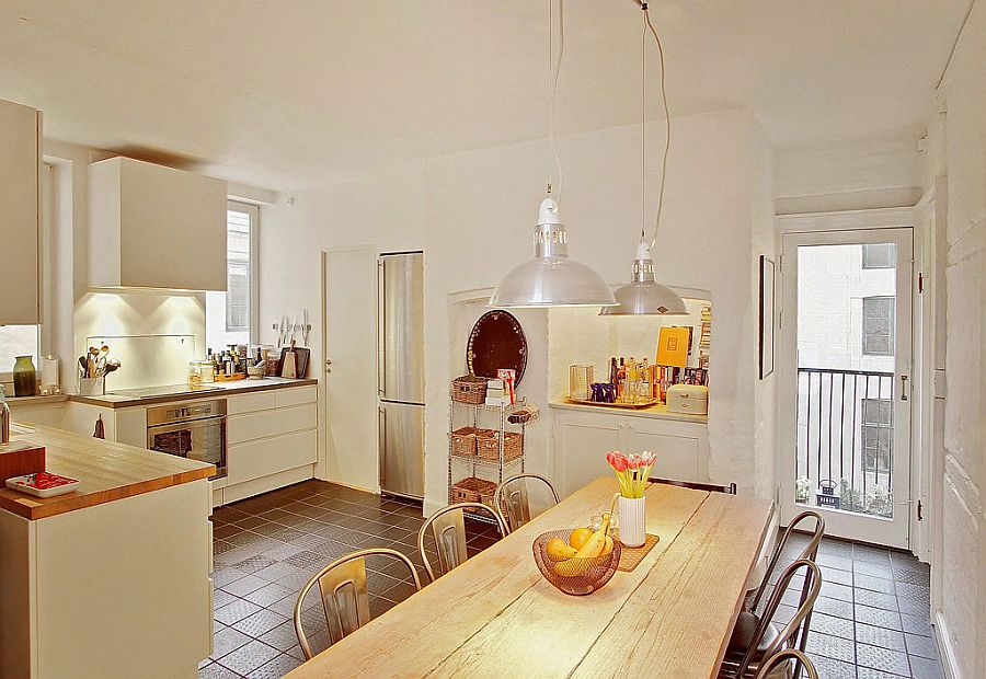 Industrial style lighting in the small dining area