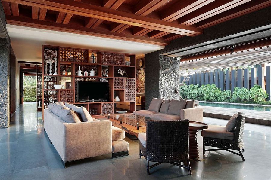 Intricate wooden shelves add to the beauty of the living room