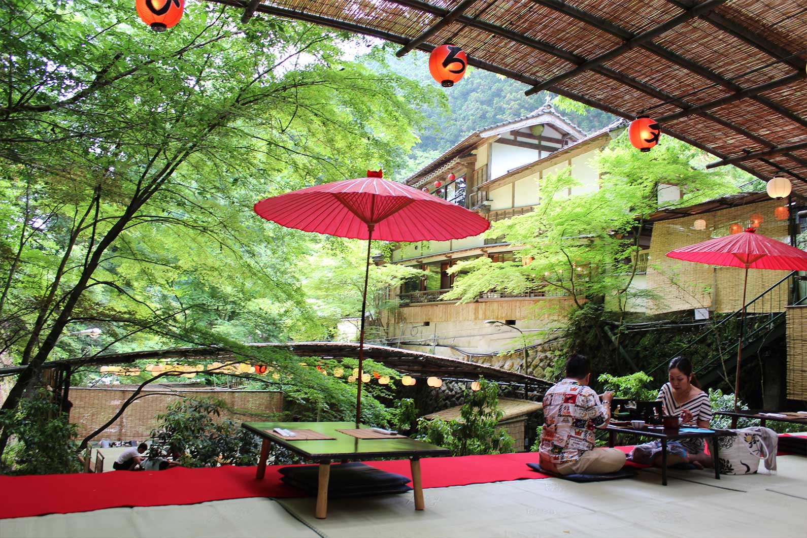 Japanese waterfall restaurant with red lanterns