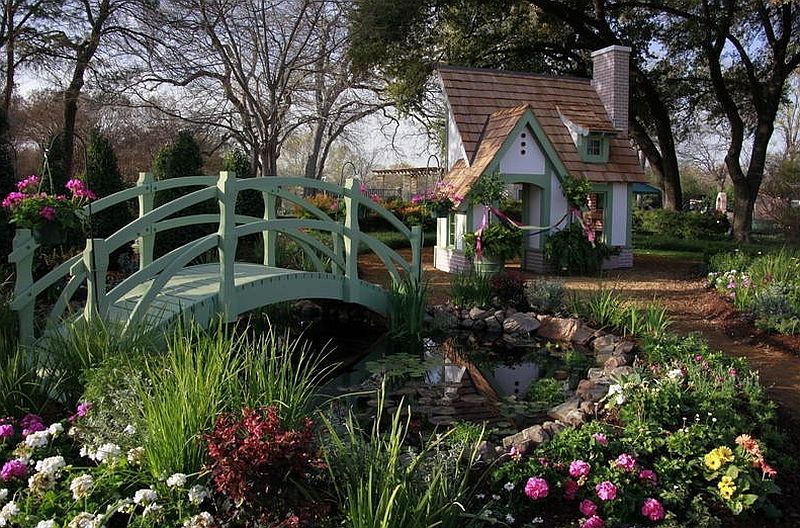 Landscape and playhouse design that seems to have popped out of a fairytale!