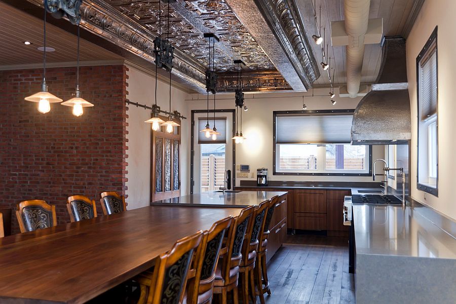 Old pulleys become an integral part of the ingenious pendant lighting [Design: Rock Cliff Custom Homes]