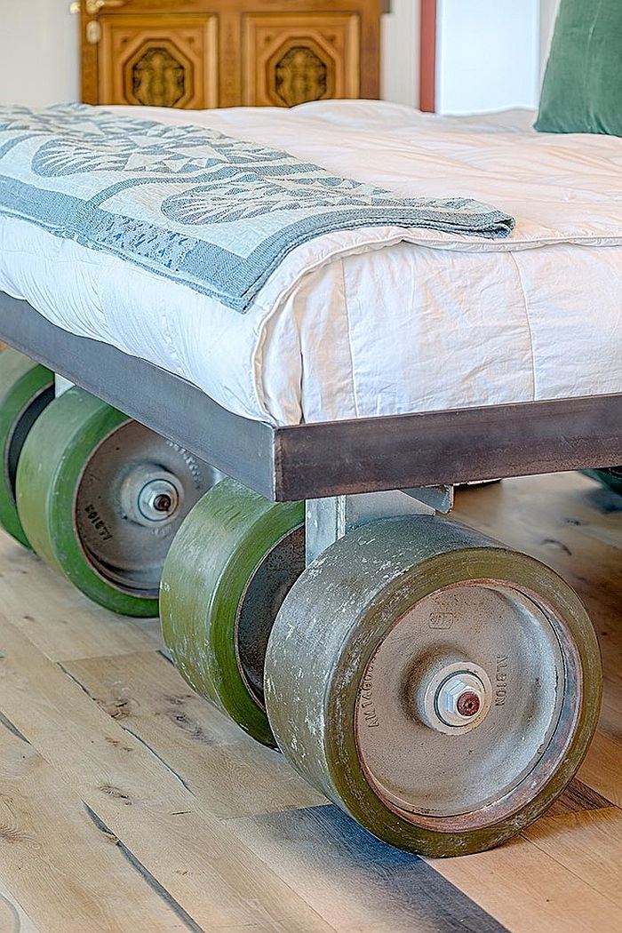 One-of-a-kind bed on wheels brings rustic elements to the contemporary home