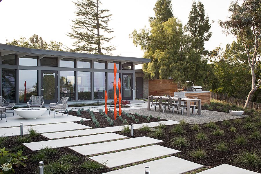 Outdoor dining, sitting area and barbeque space of the contemporary home