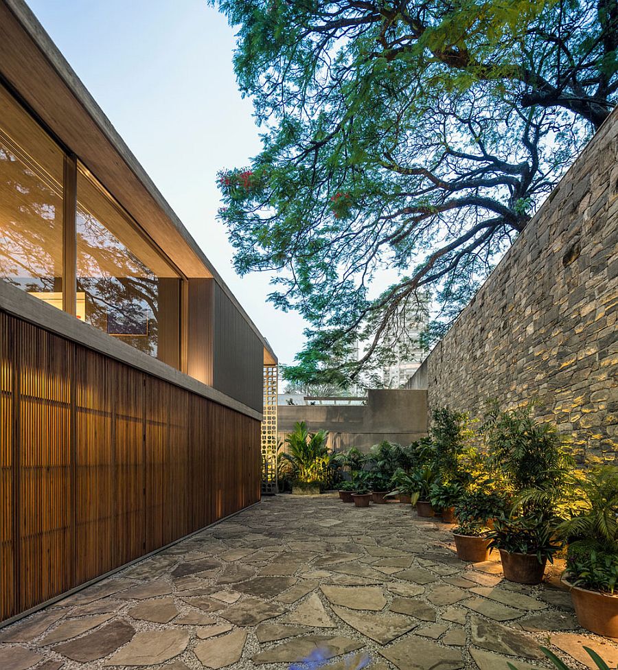 Private backyard of the B+B House with stone finish