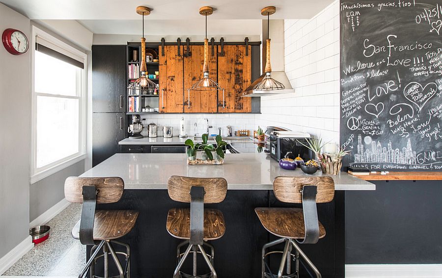 Reclaimed wood, bar stools, lighting and chalkboard paint give the kitchen great textural contrast