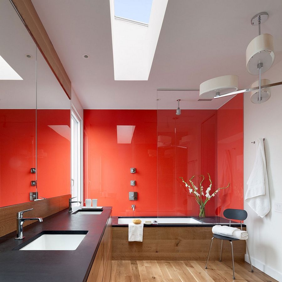 Red and black give the contemporary bathroom with skylight a dazzling appeal