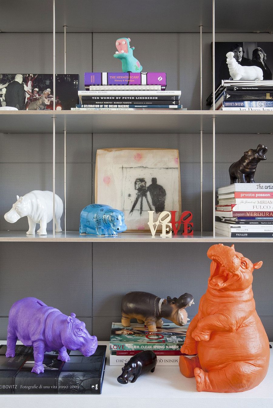 Sleek bookcases and snazzy accents in the living room