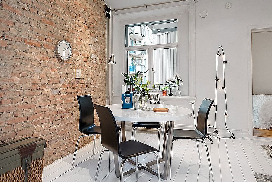 Small dining space with string lighting in the backdrop