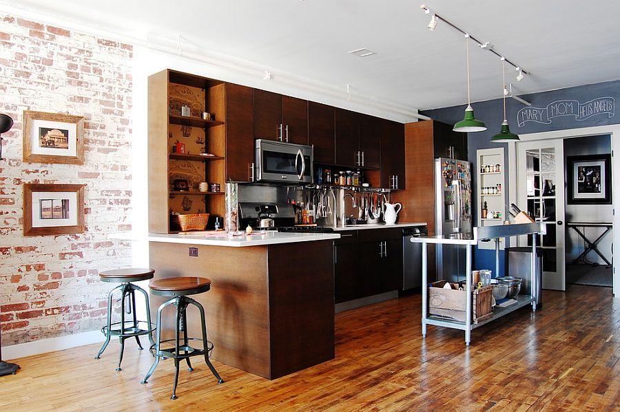 Spacious kitchen with elegant use of wood for cabinets and island [From: Corynne Pless Photography]