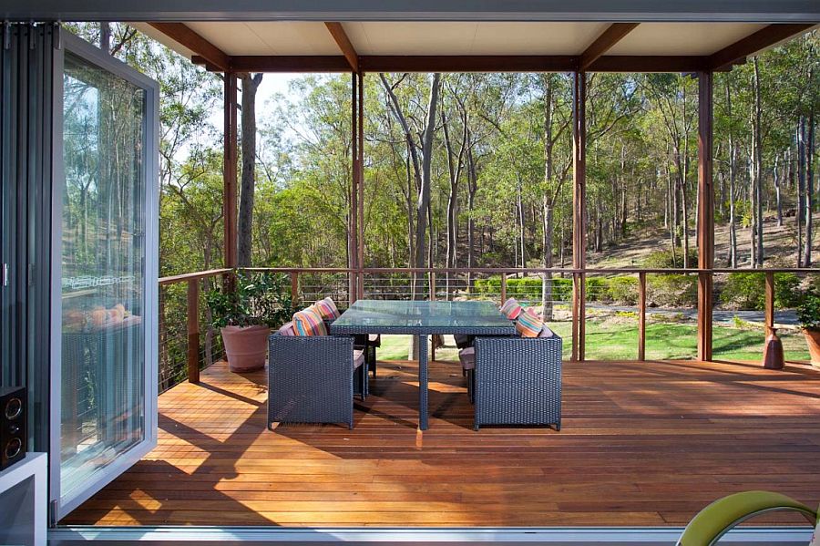 Stackable glass doors extend the living area into the porch