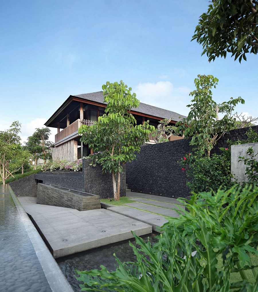 Stone and wood shape the elegant home in Bali with sea views