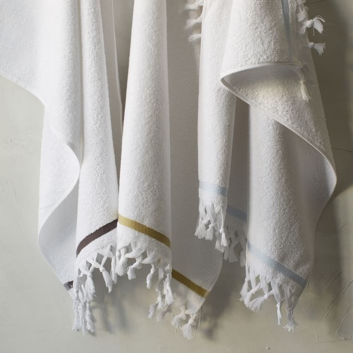 https://cdn.decoist.com/wp-content/uploads/2015/06/Tassel-terry-cloth-towels-from-West-Elm.jpg