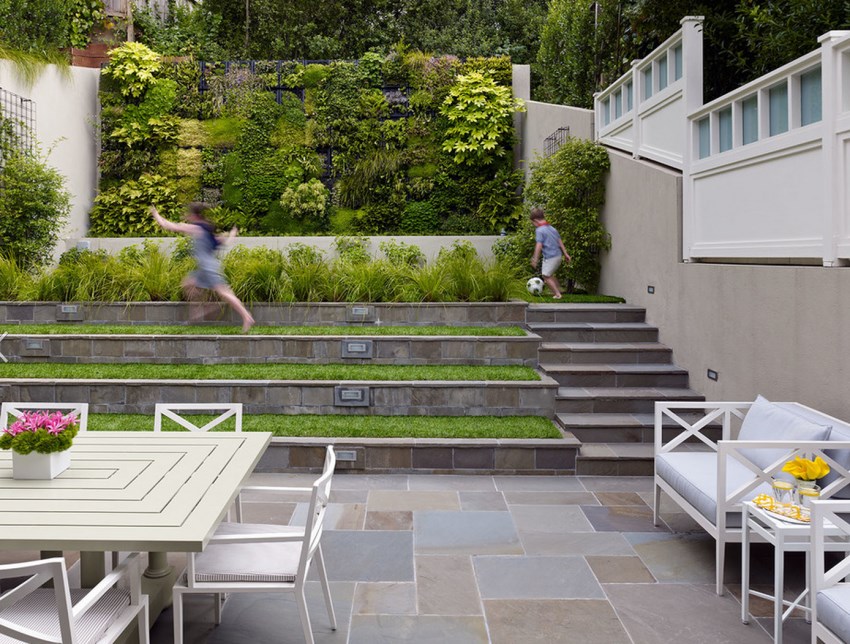 Terraced backyard with a vertical garden