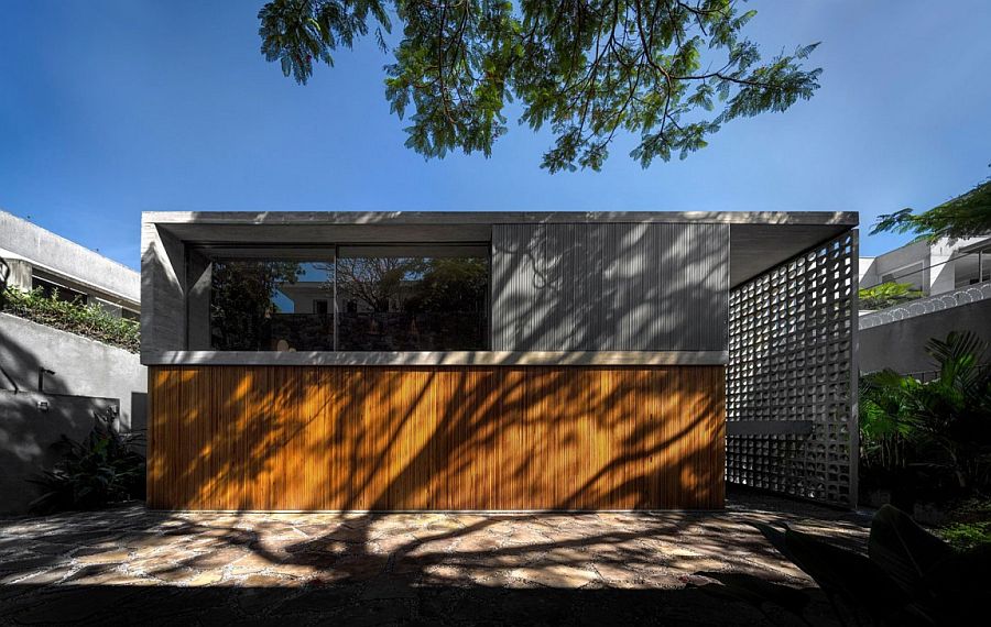 Unique facade of the Brazilian home in wood and concrete