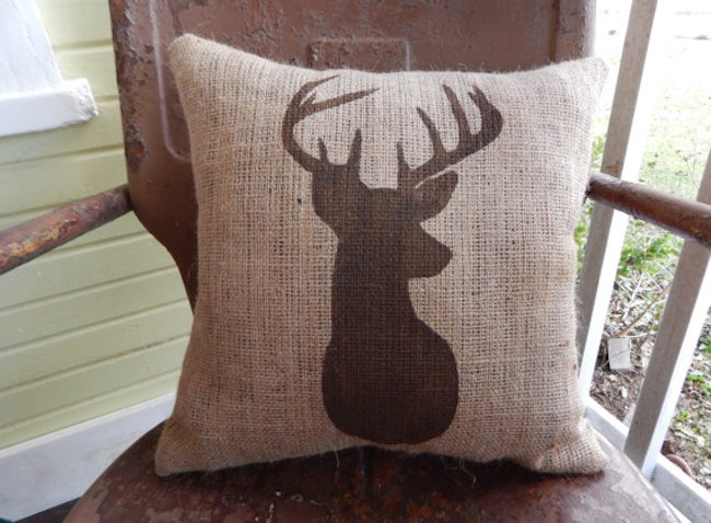 Burlap accent pillow with deer design