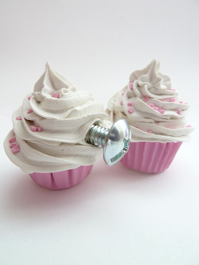 Pink cupcake door knobs bring the chic feminine vibe