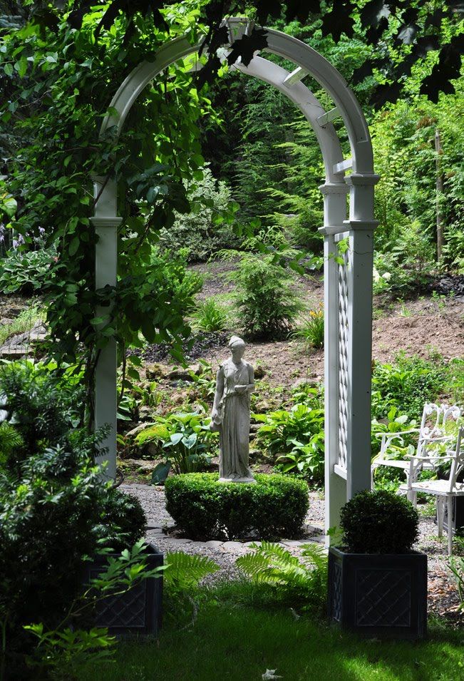 japanese stone statues in landscape