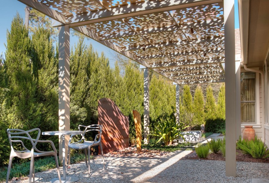 A wall of cypress trees borders a Houston patio