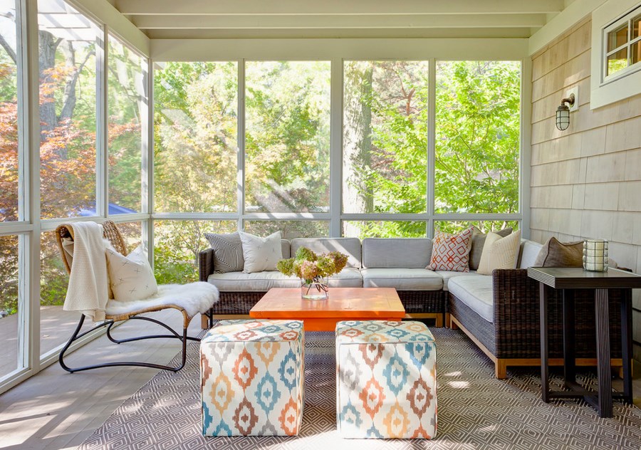 Ample seating in a screened-in porch