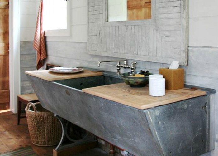 DIY bathroom vanity crafted from old  horse trough