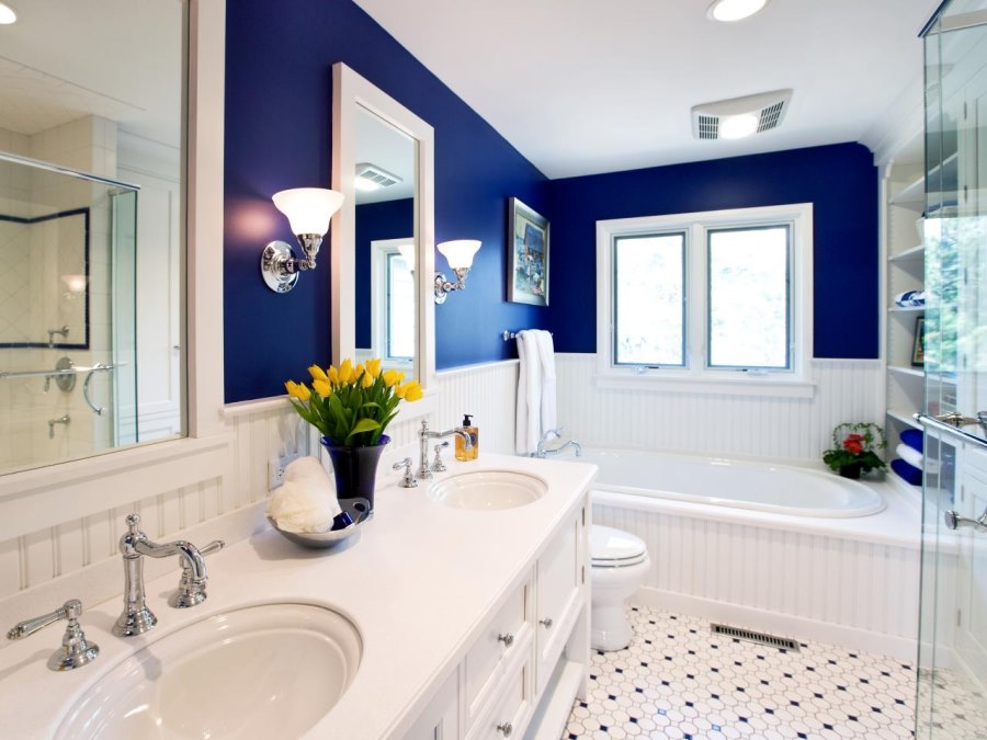 Beadboard paneling in a cobalt blue bathroom