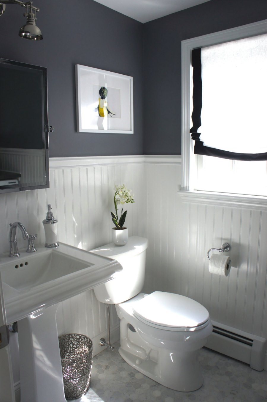 Beadboard paneling in a grey bathroom