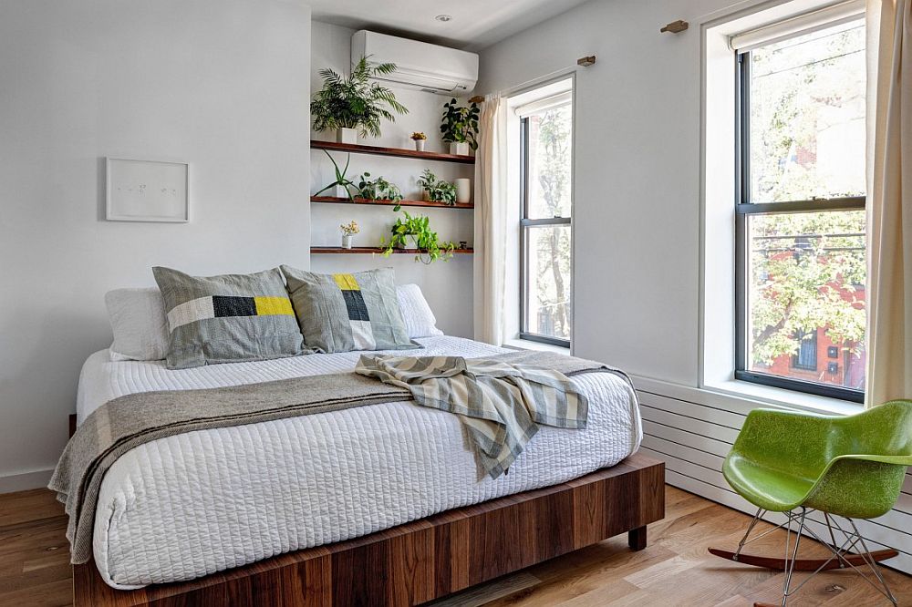 Bedroom shelves decorated with potted plants and herbs!