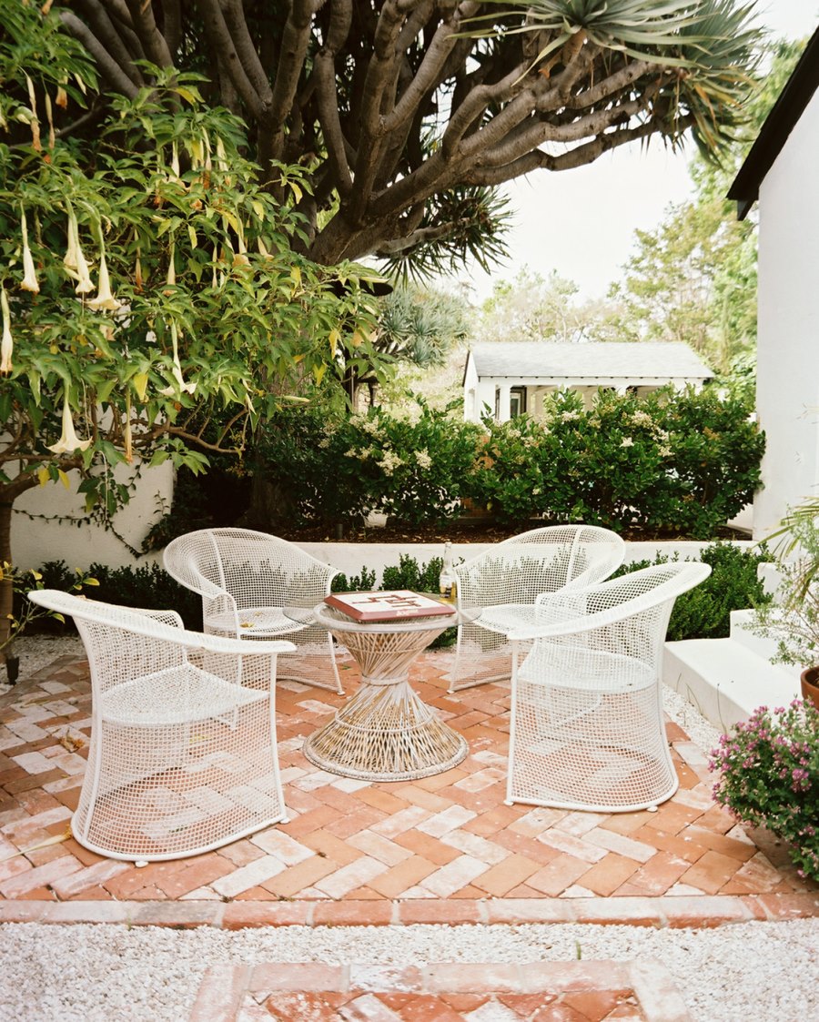 Brick patio with a herringbone pattern