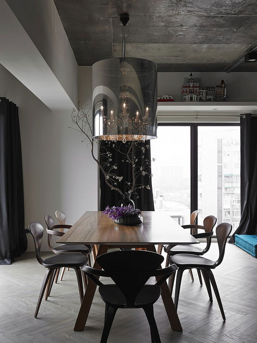 Cherner chairs at the dining room with a smart chandelier on top