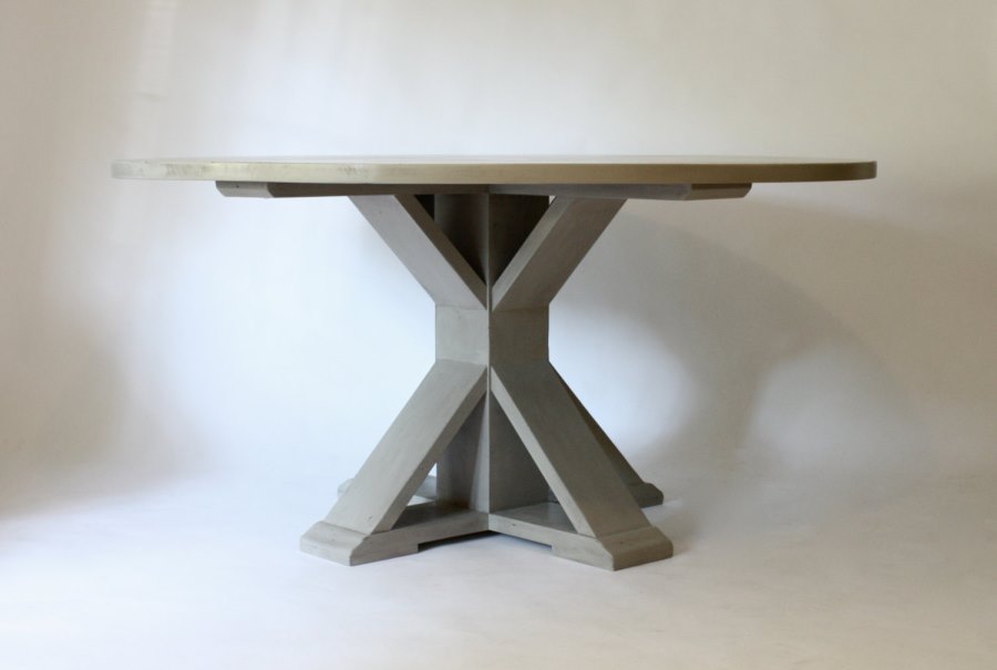 Circular trestle dining table from LM