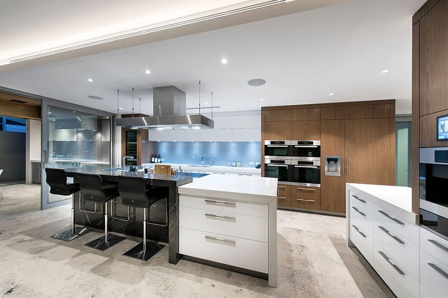 Contemporary kitchen in white with black breakfast zone and wooden shelves