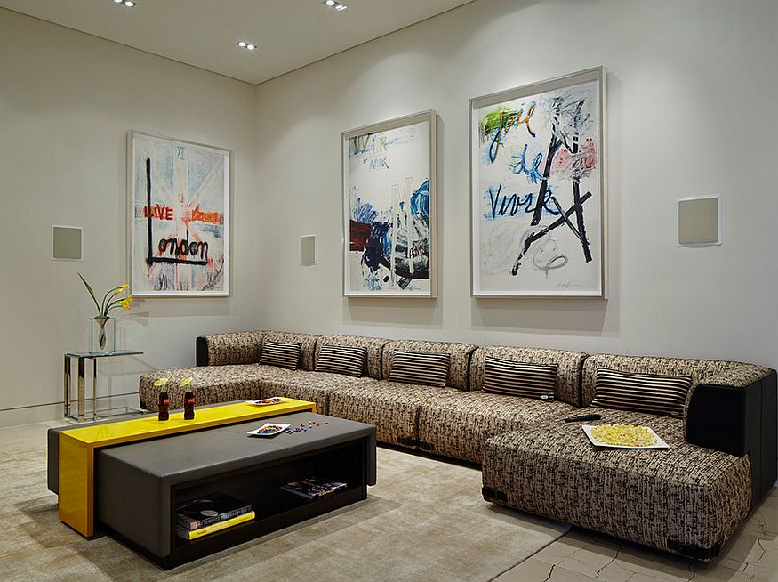Contemporary living room uses wall art in a stylish fashion [Design: Alonso & Associates]