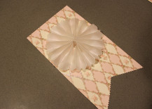 DIY-Baby-Shower-Banner-With-Intricate-Fanned-Scallop-217x155