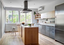 Delightful-modern-kitchen-with-a-smart-island-and-wooden-shelves-217x155