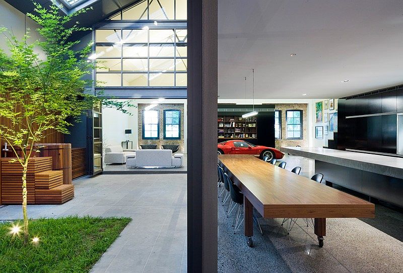 Dining area and kitchen on the lower level of the industrial home