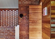 Eames-coat-hanger-adds-a-touch-of-Midcentury-beauty-to-the-brick-and-timber-home-217x155