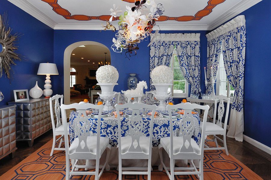 Eclectic dining room with blue and orange [Design: Kenneth Davis Lux International]