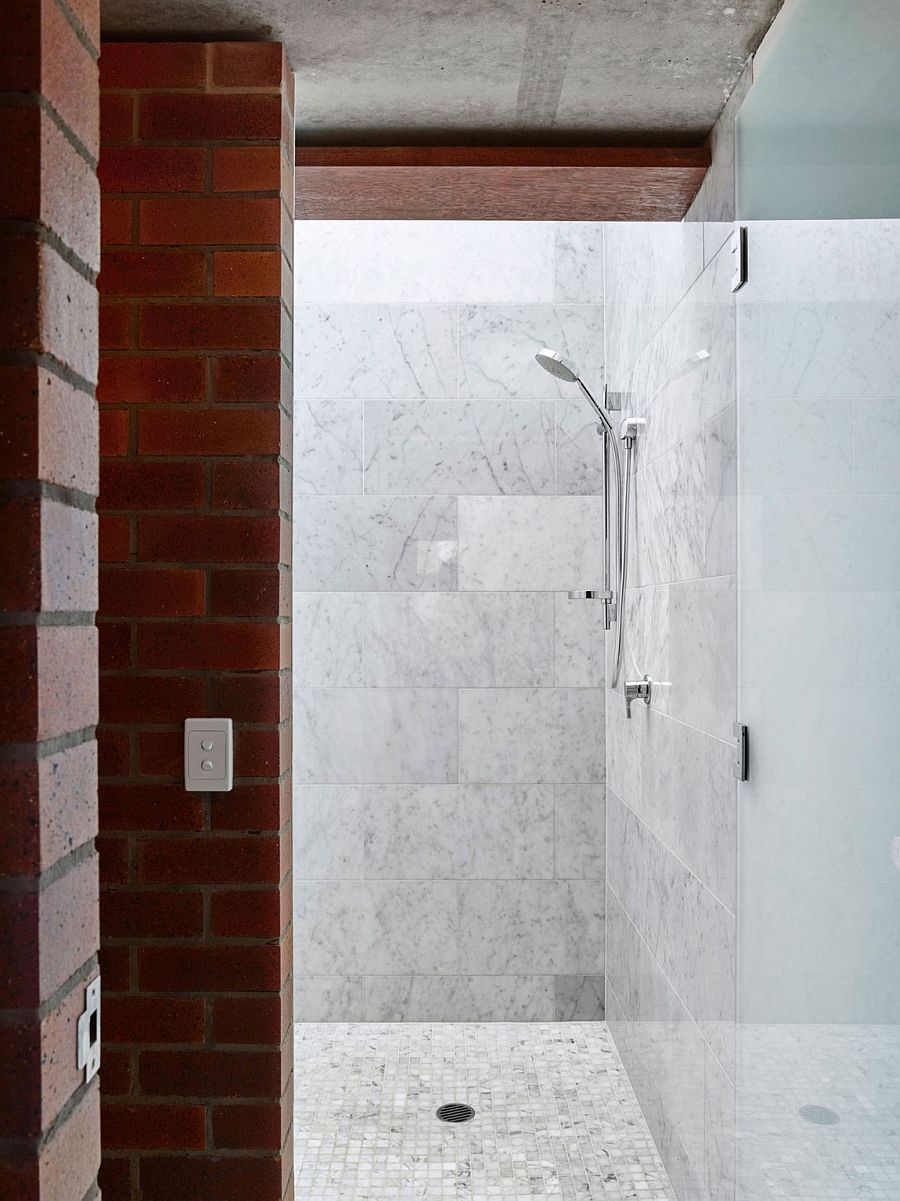 Elements of brick wall make their way into the modern bathroom