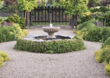 Graveled-yard-with-a-fountain-focal-point-217x155