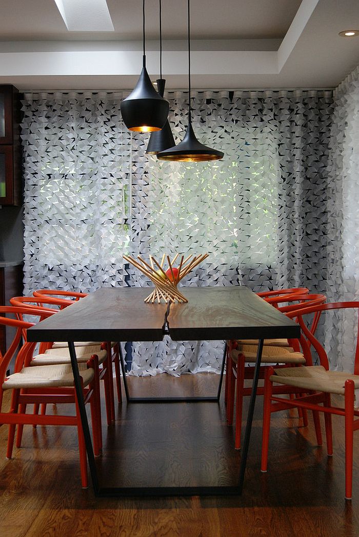 Hans Wegner CH24 Wishbone Chair in Orange for the modern dining room [Design: Ashleigh Weatherill Interior Design]