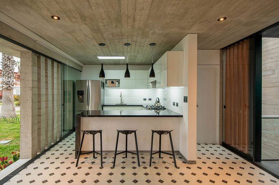 Kitchen area in concrete of the elegant becah house