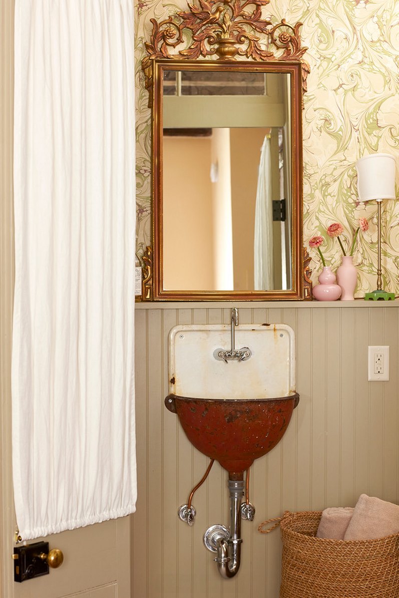 Marbled wallpaper and beadboard paneling