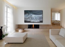 Minimal-living-room-with-wall-art-inspired-by-nature-hanging-above-the-fireplace-217x155