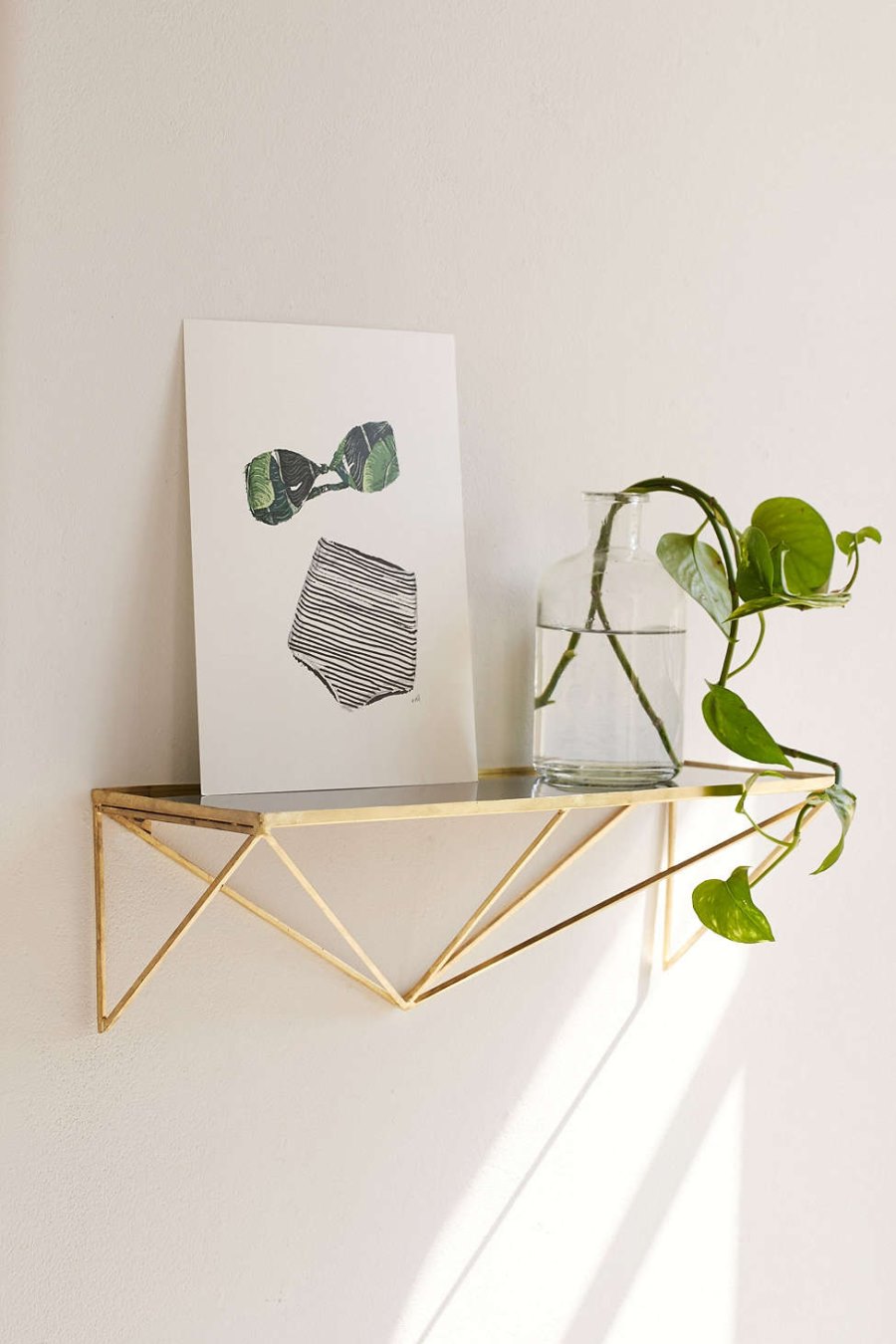 Modern glass and metal shelf from Urban Outfitters