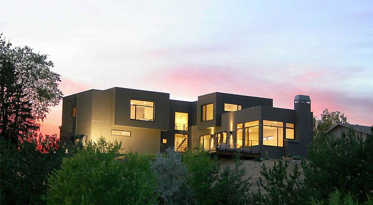 Modern stucco home with a boxy structure