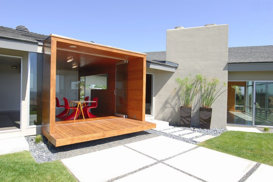 Modern stucco home with a manicured yard