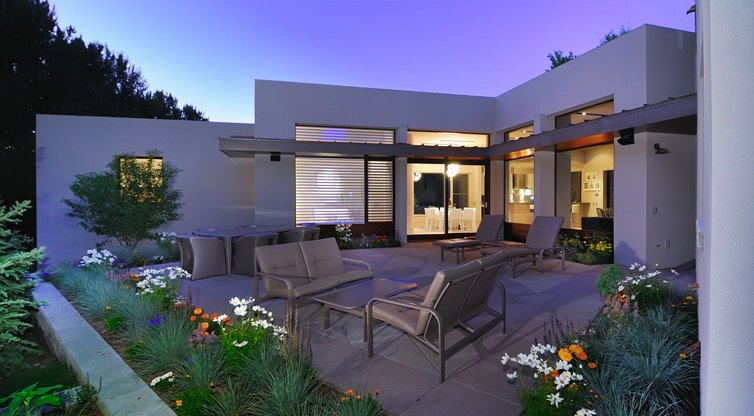 Modern stucco home with a patio