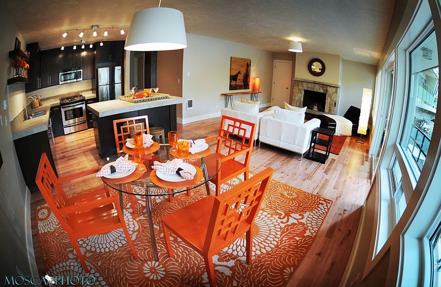 Orange gives the dining space a unique identity [From: Mosca Photo]