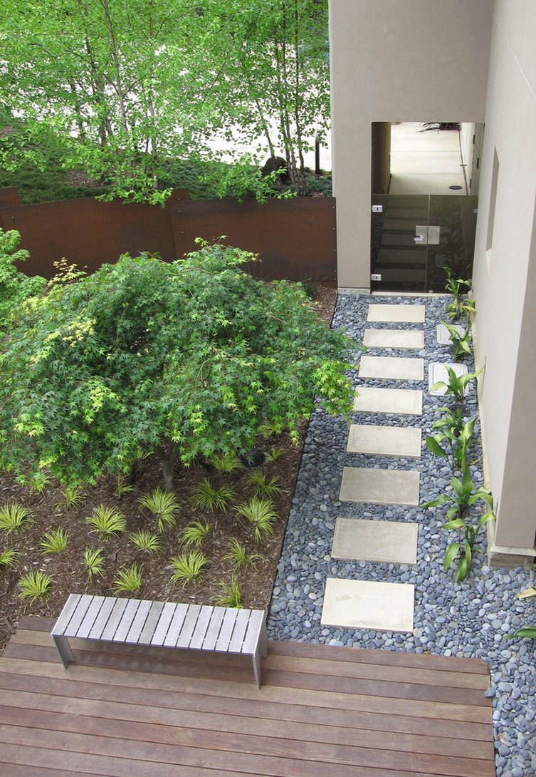 Pebbles, mulch and wood in an outdoor space